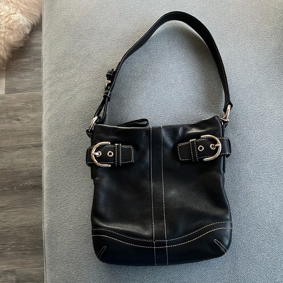 Coach Handbags - Coach black leather sm/med shoulder bag Serial no G05D-1453